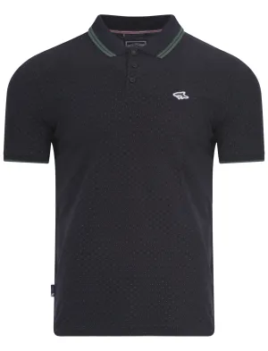 Le Shark Beckflow polo with green polka-dots